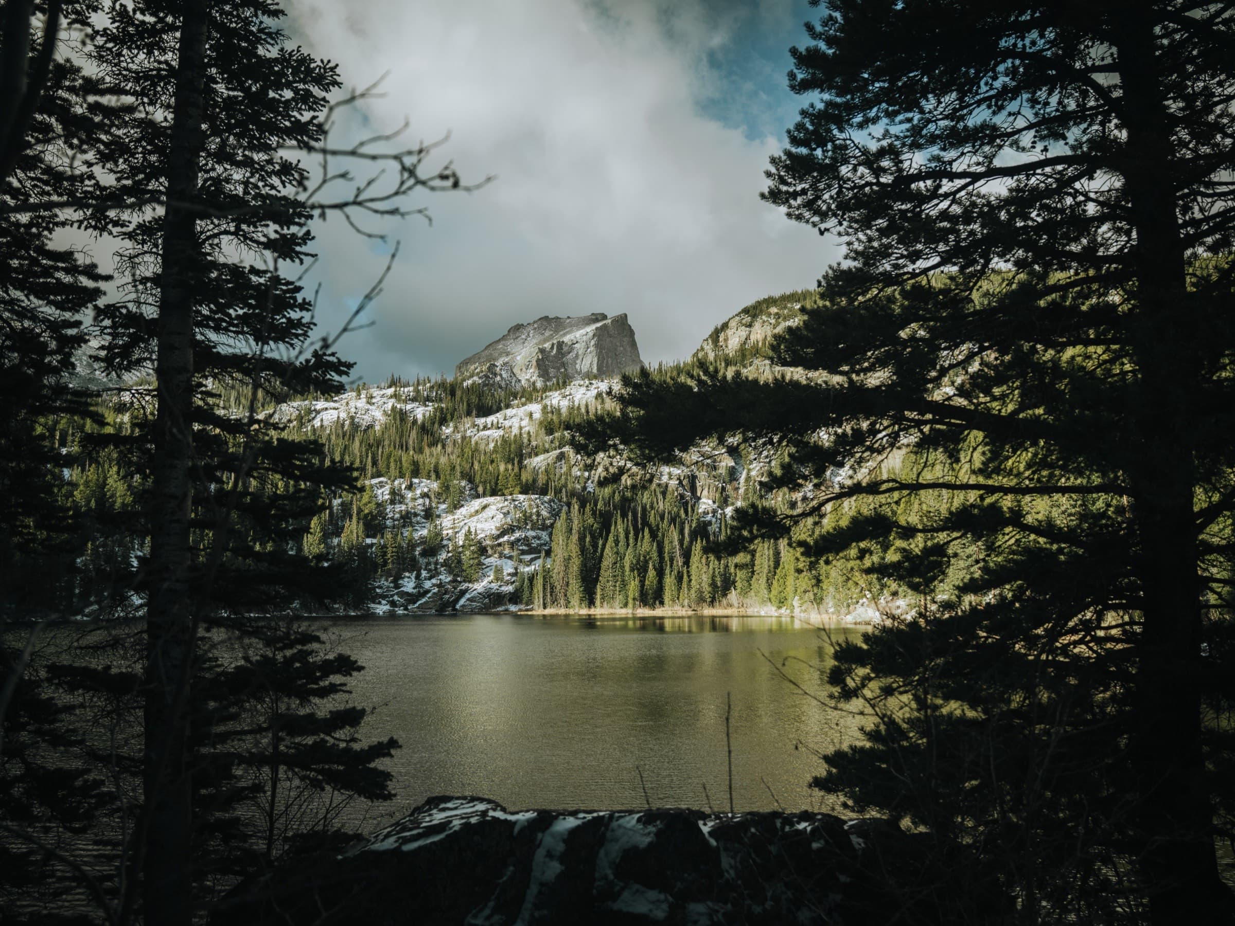 An alpine lake beneath a snow-dusted peak