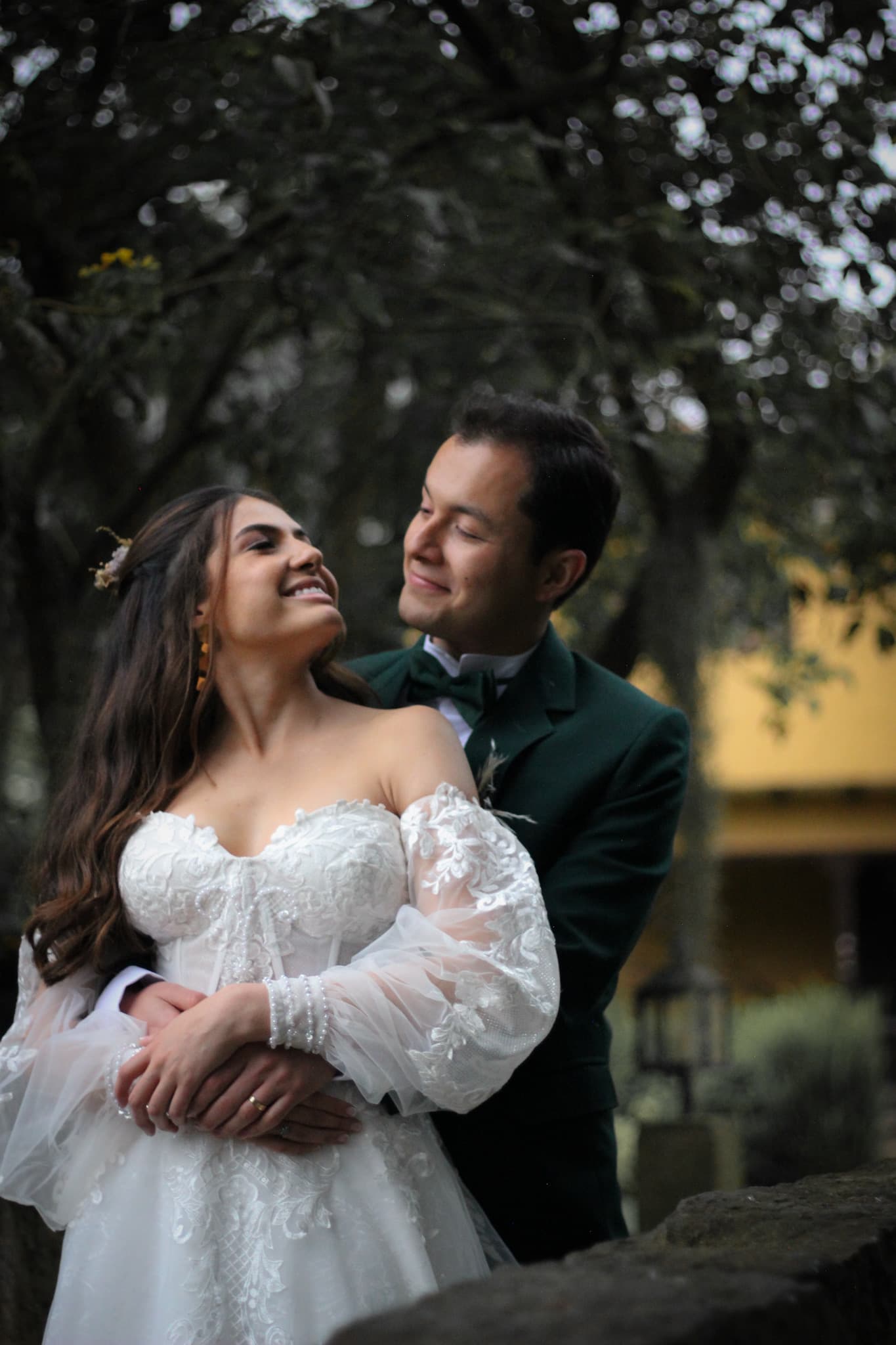 An embrace in the courtyard at dusk
